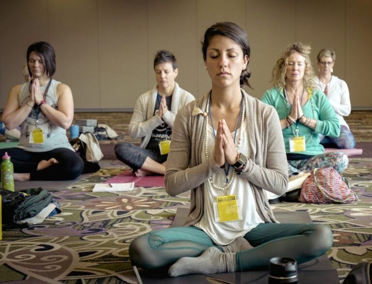 group of people doing yoga